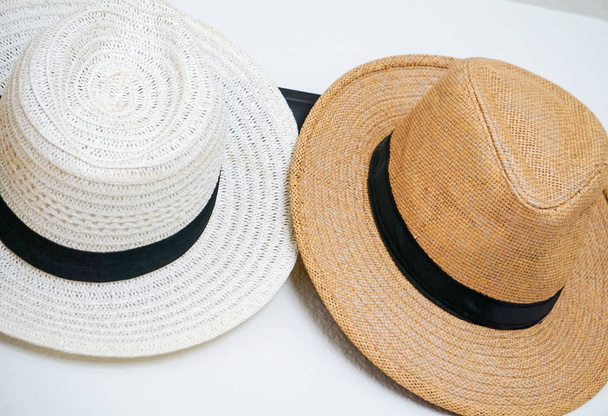 A variety of hats hung on a hook - Foto, Imagem