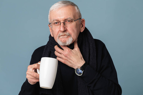 Old sick man with gray hair and beard in eyeglasses and scarf wi - Photo, Image