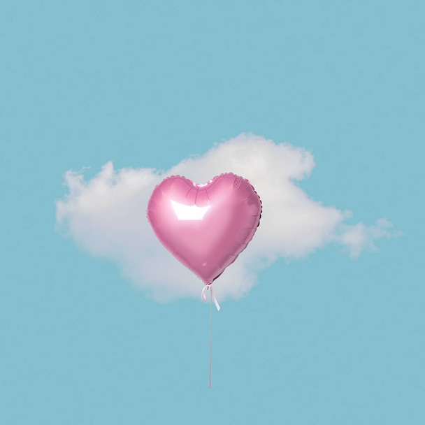 Pink heart balloon with white cloud on blue sky. Minimal love concept. - Foto, afbeelding