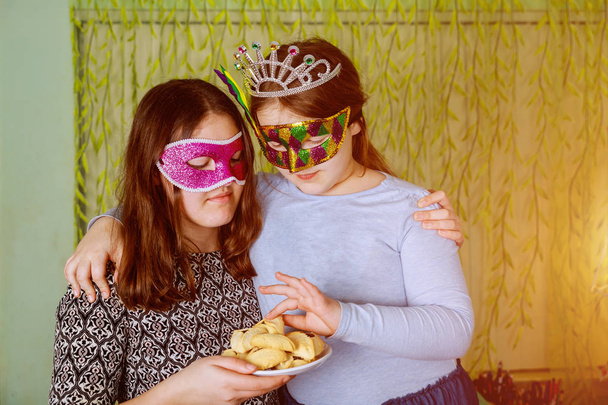 Funny little girl with mask at kids Jewish holiday Purim - Φωτογραφία, εικόνα
