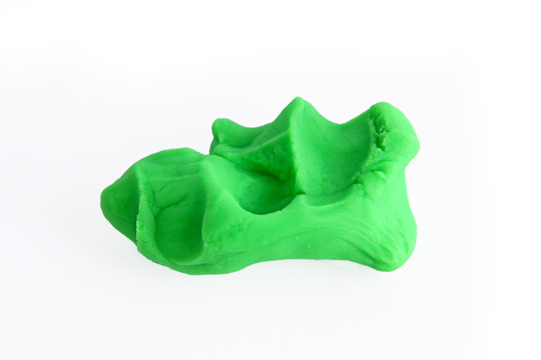 groen, vierkante plasticine textuur geïsoleerd op witte achtergrond - Foto, afbeelding