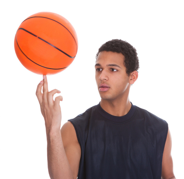 Young Sportsman Balances Ball On A Finger - Foto, Imagen