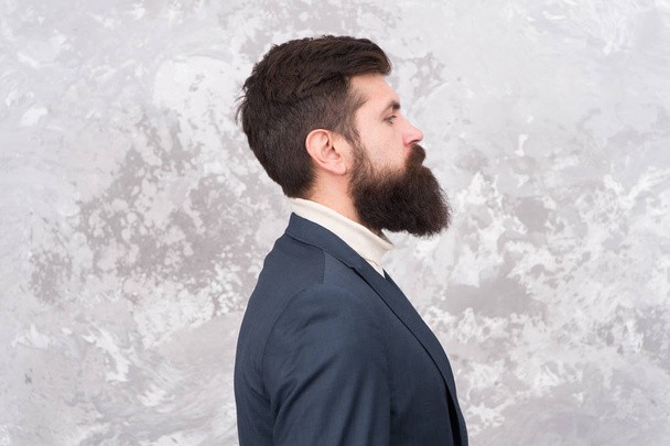 Facial hair and grooming. Man handsome bearded businessman wear formal suit. Menswear and fashion concept. Guy brutal fashion model with long beard and mustache. Business people fashion style - Foto, afbeelding