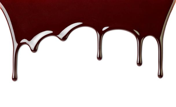 chocolade siroop dessert voedsel zoete drop lekken - Foto, afbeelding