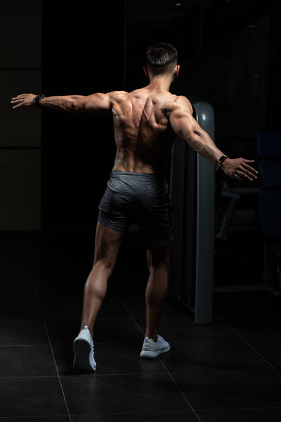 Physically Man Showing His Well Trained Back - Photo, Image