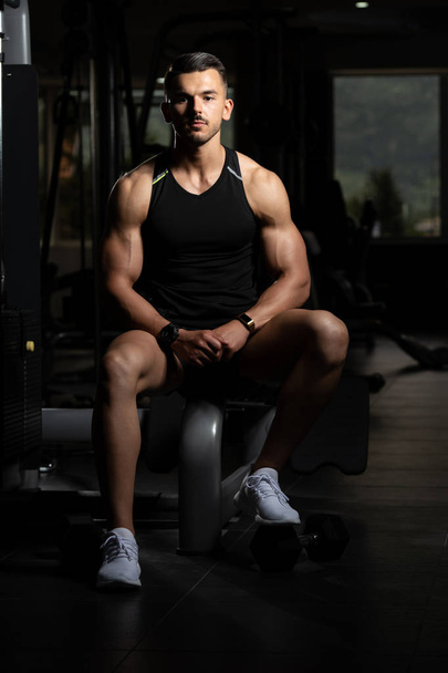Portrait Of A Handsome Man Resting At Gym - Photo, image