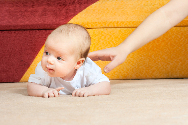 Little baby on the floor - Foto, Bild