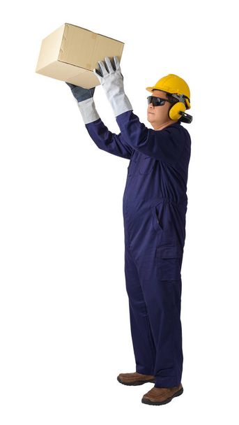 portrait of a worker in Mechanic Jumpsuit Was carrying a box iso - Fotó, kép
