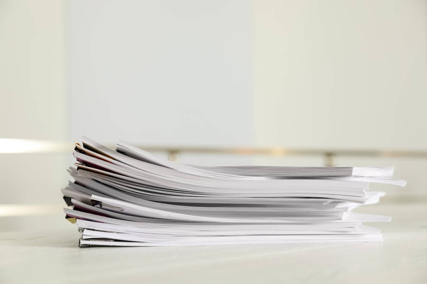 Stack of documents with paper clips on office table. Space for text - Fotó, kép