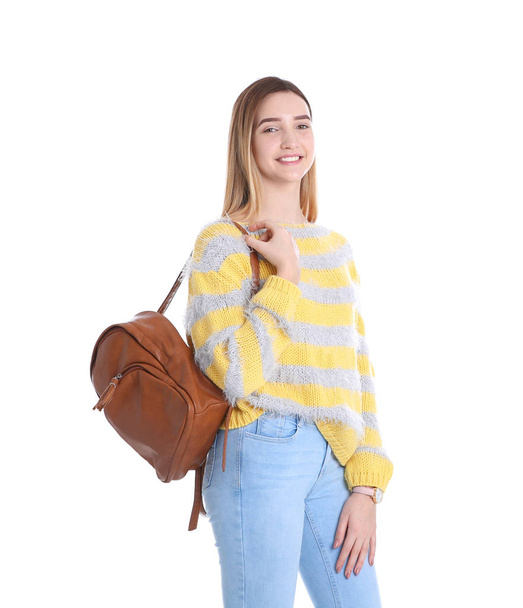 Teenage girl with backpack on white background - Foto, afbeelding
