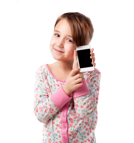 Portrait of emotional child girl with phone - Zdjęcie, obraz
