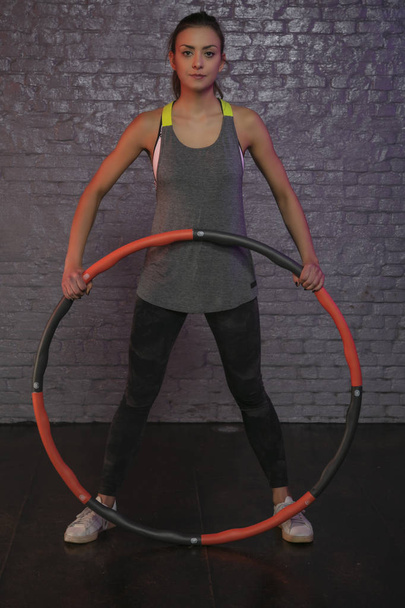 young girl practicing with hula hoop - Фото, изображение