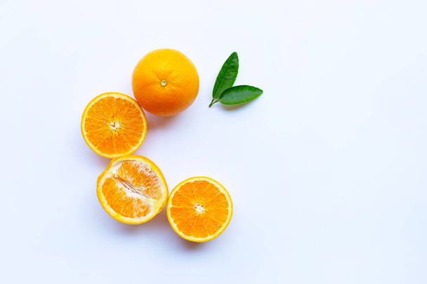 High vitamin C. Fresh orange citrus fruit with leaves isolated o - Fotó, kép