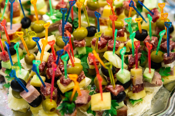 Snacks on skewers on the buffet table. - Photo, Image