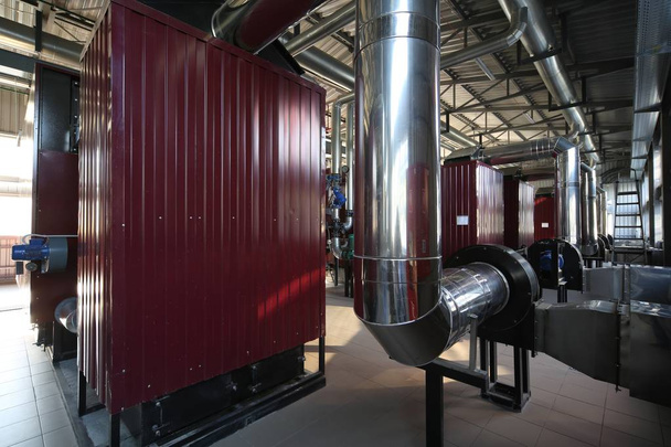 Wide-angle panoramic photo of the newest alternative fuel boiler room with pipes, towers and tanks, on a clear summer day, without people - Photo, Image