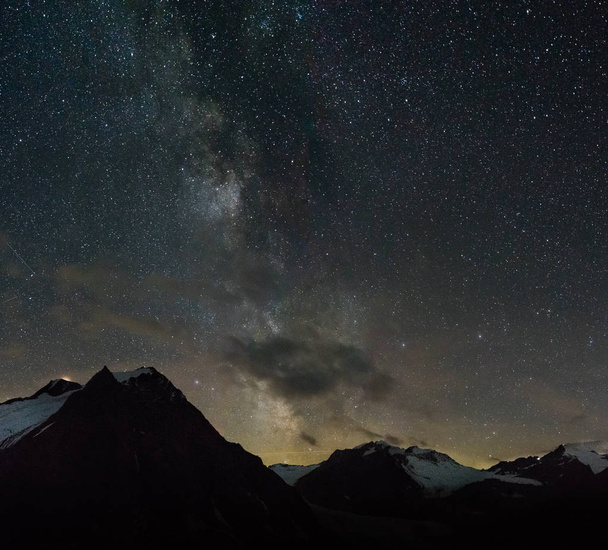 Milky Way over mountains in Alps region - Фото, изображение