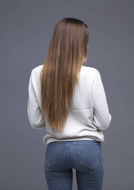 Female Long brunette hair, rear view - Foto, Bild