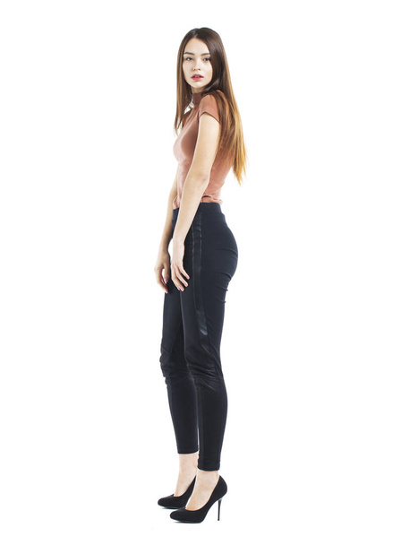Full body, Young beautiful brunette woman in black pants - Foto, Imagen