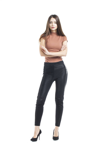 Full body, Young beautiful brunette woman in black pants - Zdjęcie, obraz