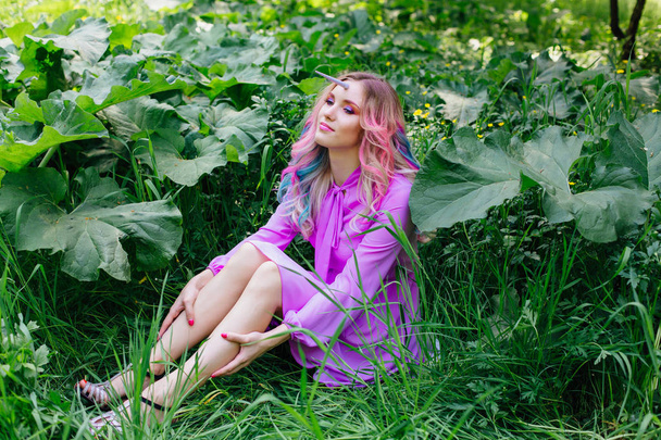 Fairy girl unicorn with pink hair in summer forest - Foto, immagini