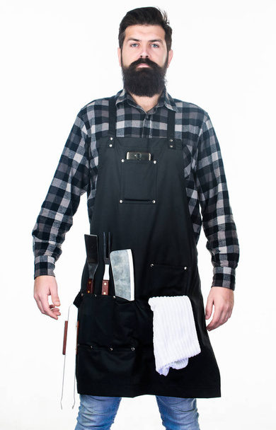 Becoming a professional chef. Barbecue master class at grill restaurant. Confident grill master in working uniform. Master chef wearing grill apron with barbecue tools. Master of grill - Φωτογραφία, εικόνα