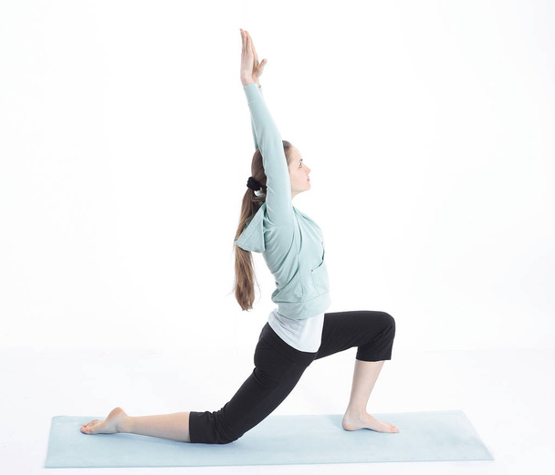 fitness woman doing stretching exercise.isolated on a white - Φωτογραφία, εικόνα