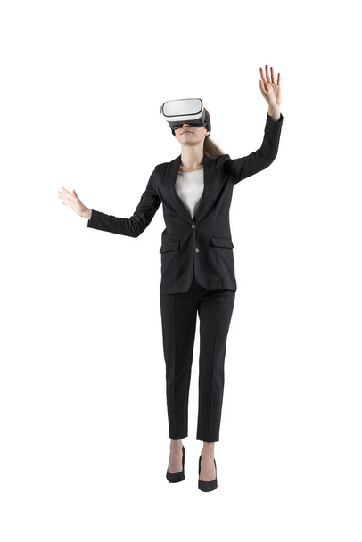 Gesturing businesswoman in VR glasses, isolated - Photo, Image