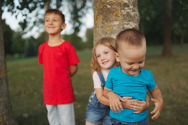 photo of happy children in park - Φωτογραφία, εικόνα