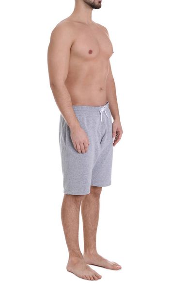 Young man on white background, closeup. Weight loss - Valokuva, kuva