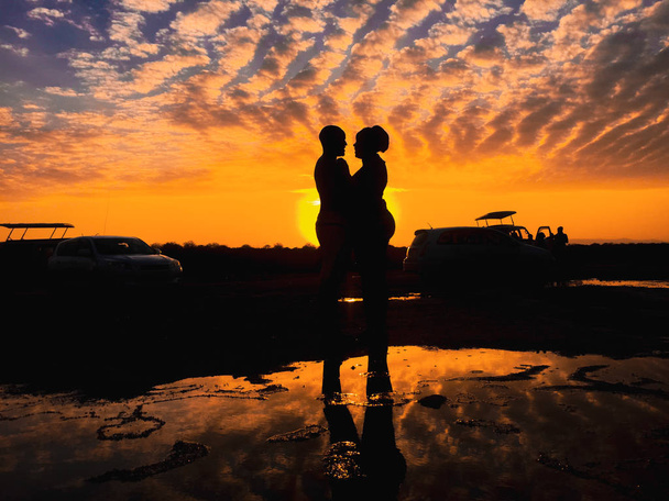 Silhouette of a romantic couple against sunset, Lake Magadi - Photo, Image
