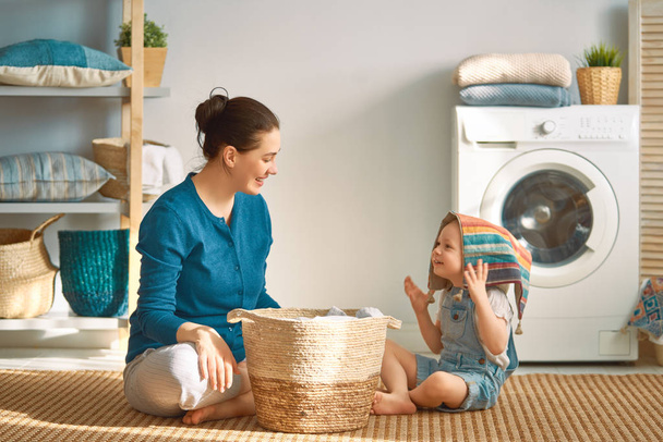 family doing laundry - Zdjęcie, obraz