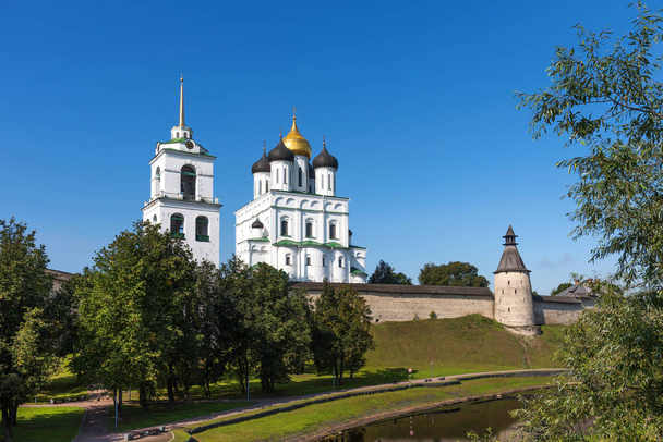 Panoramic view of Pskov Kremlin on the Velikaya river. Ancient fortress. The Trinity Cathedral in summer. Pskov. Russia - Zdjęcie, obraz