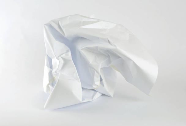 Crumpled paper on white background - Фото, зображення