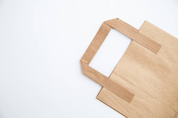 Cardboard bags on white isolated background. Top view - Photo, Image