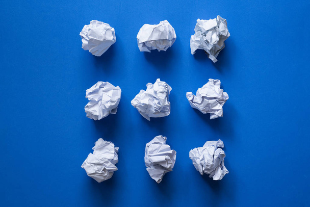 collection of various crumpled paper on blue background - Photo, image