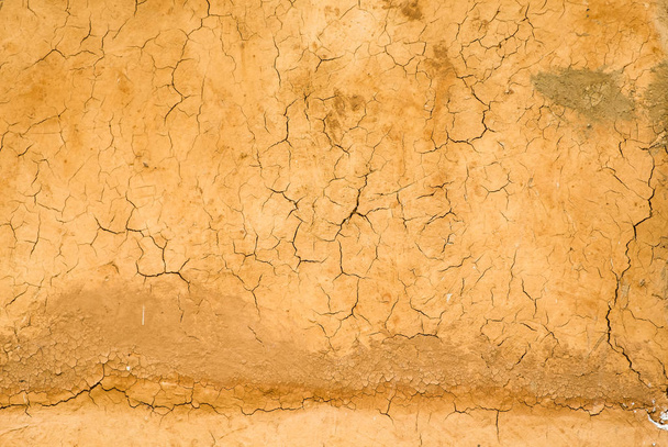 Помаранчева поверхня стінки ґрунту тріщина
 - Фото, зображення