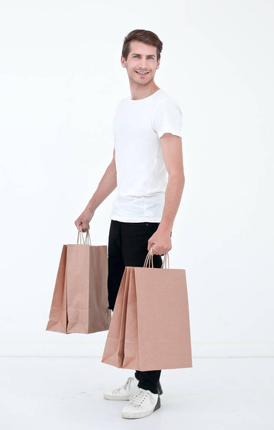 Guy satisfied carries bag - Foto, Bild
