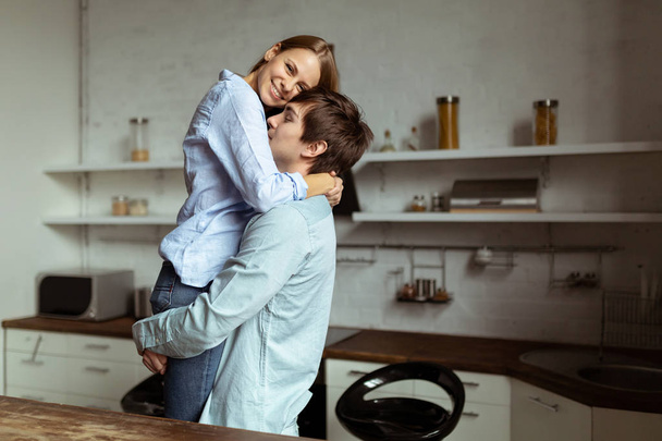 Full length image of romantic couple at home - Zdjęcie, obraz
