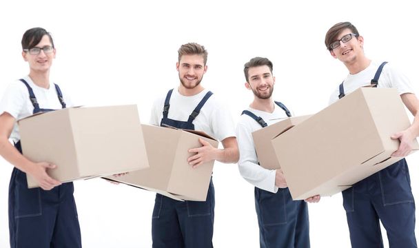 photo workers holding boxes when moving flats, - Фото, изображение