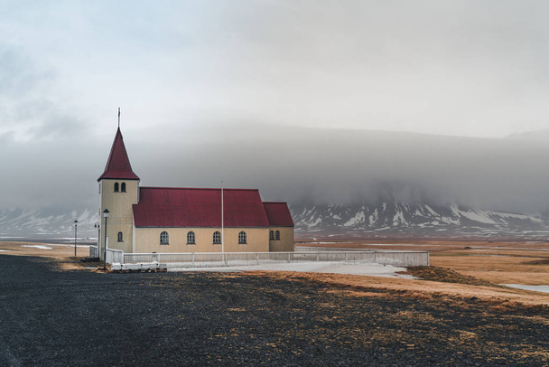 Colorful Red and White Wooden Church in Landscape with Glacial Mountain, Rural Iceland - Fotoğraf, Görsel