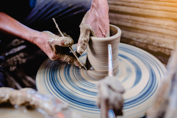 pottery, workshop, ceramics art concept - closeup on male hands - Photo, Image
