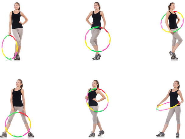 Young woman with hula hoop isolated on white  - Photo, image