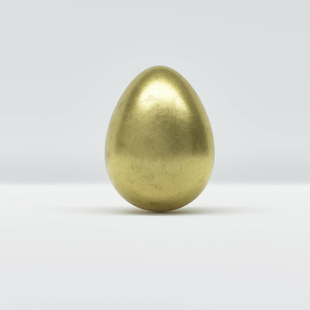 Одне золоте пасхальне яйце на білому тлі
 - Фото, зображення