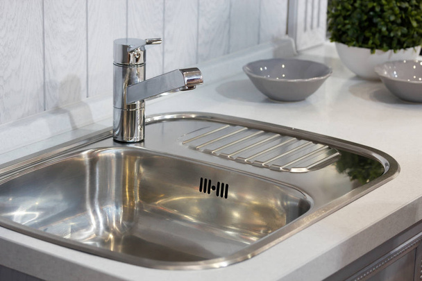 sink with a tap in a kitchen - Zdjęcie, obraz