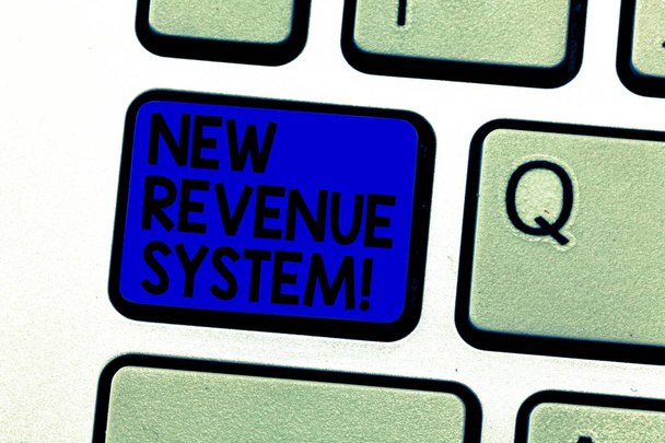 Writing note showing New Revenue System. Business photo showcasing income business got from its activities usually sales Keyboard key Intention to create computer message pressing keypad idea. - Photo, Image
