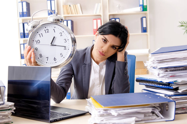 Middle aged businesslady unhappy with excessive work  - Photo, Image