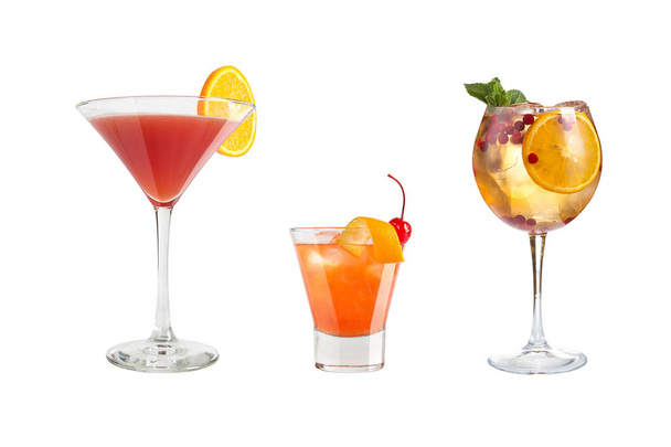 A variety of alcoholic drinks, beverages and cocktails on a white background. Three refreshing drinks in different glass goblets. - Photo, image