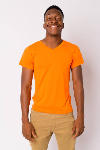 Portrait of young happy African man smiling - Foto, imagen