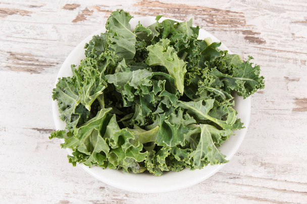 Fresh healthy nutritious curly kale as ingredient of coctail - Foto, immagini
