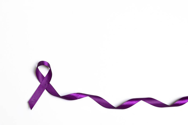 Purple epilepsy awareness ribbon on a white background with copy - Fotoğraf, Görsel